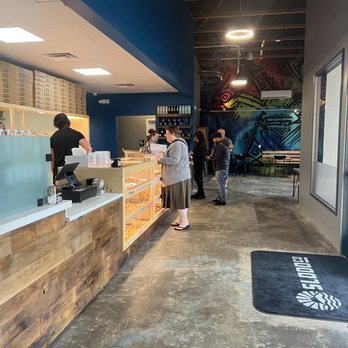 Slodoco Donuts - Front cases and back seating area - Donuts Near Me - Goleta, California
