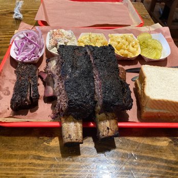 Terry Black's Barbecue - Brisket, beef rib, Mac and cheese, onions, bread, pickles - Barbeque Near Me - Austin, Texas Terry Black's Barbecue - Brisket, beef rib, Mac and cheese, onions, bread, pickles - Barbeque Near Me - Austin, Texas
