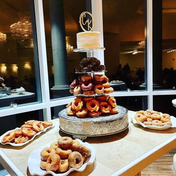Sarah Donuts - a wedding cake and donuts on a table - Donuts Near Me - Roswell, Georgia Sarah Donuts - a wedding cake and donuts on a table - Donuts Near Me - Roswell, Georgia
