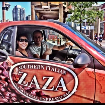 Zaza Espresso Bar - a man and woman in a car - Coffee & Tea Near Me - Toronto, Ontario Zaza Espresso Bar - a man and woman in a car - Coffee & Tea Near Me - Toronto, Ontario