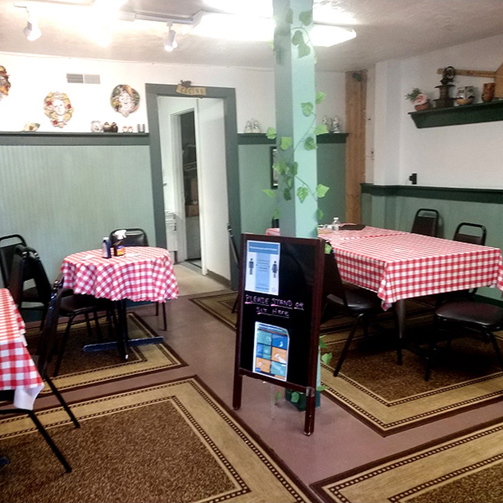 Cucina di Gerardo - tables and chairs in a restaurant - Italian Near Me - Brighton, Vermont Cucina di Gerardo - tables and chairs in a restaurant - Italian Near Me - Brighton, Vermont