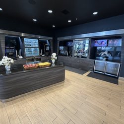 Exec Rent A Car - Plush lounge with fresh fruit, coffee and cold drinks