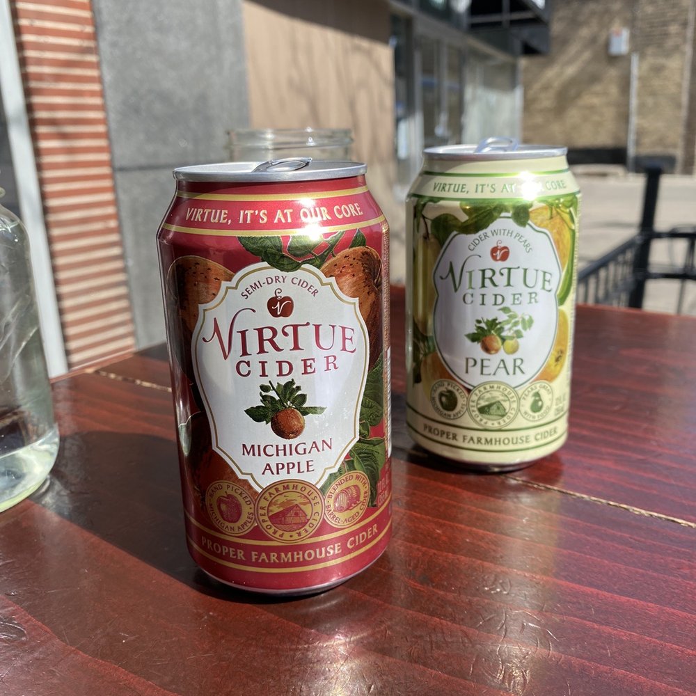 Flagship Tavern and Grill - two cans of beer on a table - American Near Me - Chicago, Illinois Flagship Tavern and Grill - two cans of beer on a table - American Near Me - Chicago, Illinois