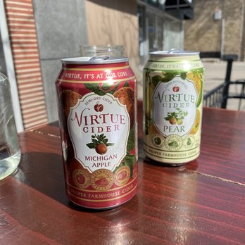 Flagship Tavern and Grill - two cans of beer on a table - American Near Me - Chicago, Illinois