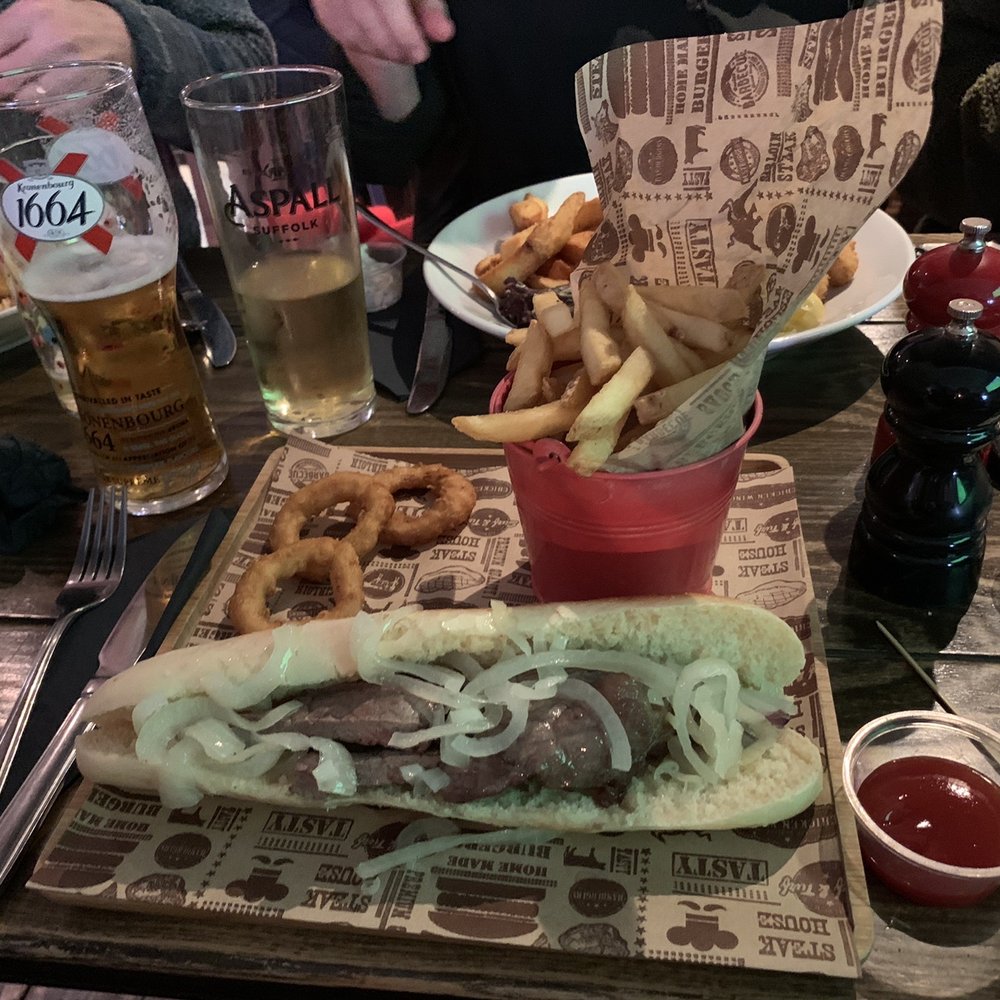 Pig & Whistle - Steak and onion baguette with fries £12 - Pubs Near Me - London, XGL Pig & Whistle - Steak and onion baguette with fries £12 - Pubs Near Me - London, XGL