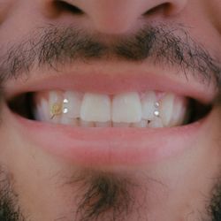 18k gold + Swarovski tooth gems