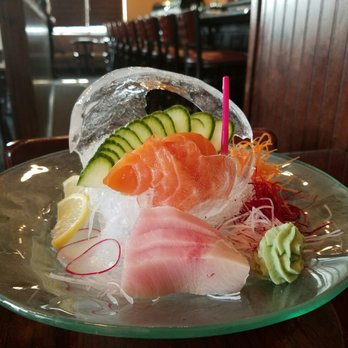 Thida Thai - Salmon and Yellowtail Sashimi. Yes, that is a miniature ice sculpture! - Thai Near Me - Smyrna, Tennessee Thida Thai - Salmon and Yellowtail Sashimi. Yes, that is a miniature ice sculpture! - Thai Near Me - Smyrna, Tennessee