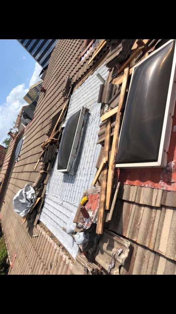 Slide of D Campos Roofing