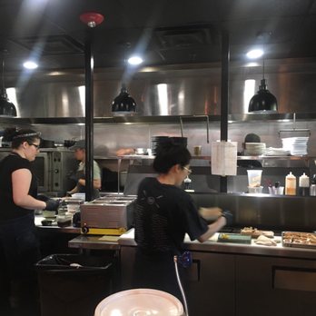 DOMU - Truly open Kitchen! Ramen bowls assembly starts left and moves right (Tray of Eggs on the right) - Ramen Near Me - Orlando, Florida DOMU - Truly open Kitchen! Ramen bowls assembly starts left and moves right (Tray of Eggs on the right) - Ramen Near Me - Orlando, Florida