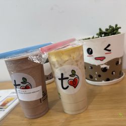 TeaLove Fontana - Left: banana chocolate milkshake blend Right: Vanilla Coffee with crème brûlée whip or soft top lol