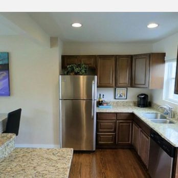 Thunder Remodeling - a kitchen with stainless steel appliances - General Contractors Near Me - Park Ridge, Illinois