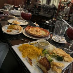 Fernandes Steakhouse lll - Sea bass, shrimp in green sauce with side of rice and chips. Yum!