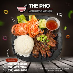 The Pho - Delight in the tender, marinated grilled meat atop a bed of fluffy rice, complemented by fresh vegetables and our signature Vietnamese