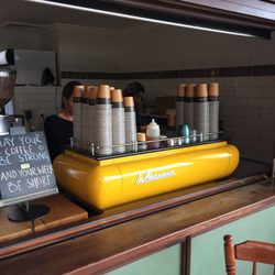 Riviera Top Shoppe - The new coffee machine. Mellow yellow.