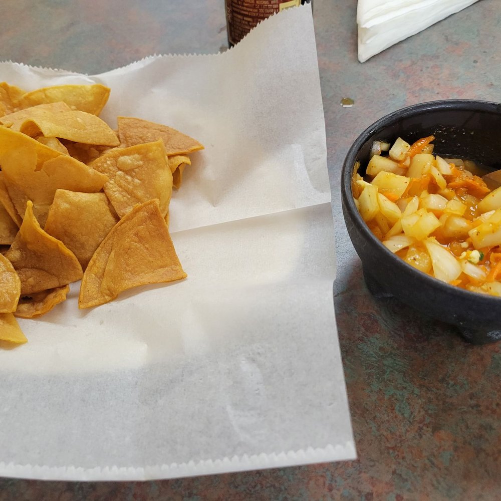 Chips and salsa. Salsa has a good spice level and is delicious!