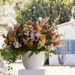 Vaso Bello Celebrations - Dull ceremony flowers that lacked consistency with other arrangements.