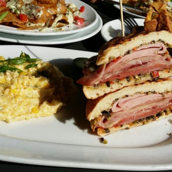 Marlow's Tavern - Big easy Muffaleta with side of jalapeño corn grits - Gastropubs Near Me - Duluth, Georgia