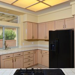 Butierez Painting - Before a metal flake finish. Replacing these cabinets would cost $30,000 and we painted for $4,200.00
