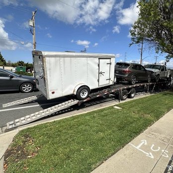 Exclusive Auto Shipping - Driver had my Trailer hanging off the back and damages the axle and blew out the tire. - Vehicle Shipping Near Me - Tallahassee, Florida Exclusive Auto Shipping - Driver had my Trailer hanging off the back and damages the axle and blew out the tire. - Vehicle Shipping Near Me - Tallahassee, Florida