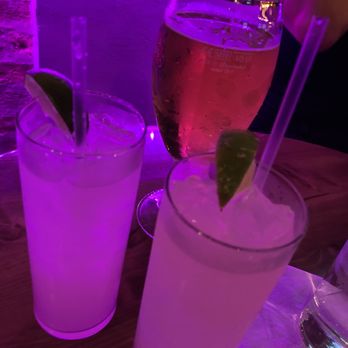DSTRKT Bar & Grill - two drinks on a table - Sports Bars Near Me - Chicago, Illinois DSTRKT Bar & Grill - two drinks on a table - Sports Bars Near Me - Chicago, Illinois