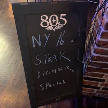 The Tavern - Steak special on chalkboard, no mention of Market Price. - American Near Me - Las Vegas, Nevada The Tavern - Steak special on chalkboard, no mention of Market Price. - American Near Me - Las Vegas, Nevada