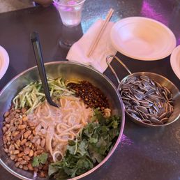 dan dan noodles & complimentary sunflower seeds dan dan noodles & complimentary sunflower seeds