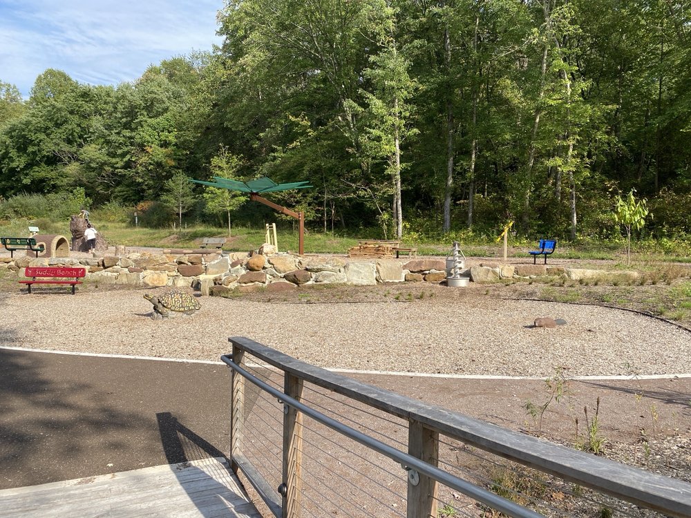 Woodlands Stewardship Educational Center Logo