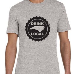 Oak City Collection - Our NC Bottle Cap shirt is one of our most popular. Available in heather blue with a while logo as well.