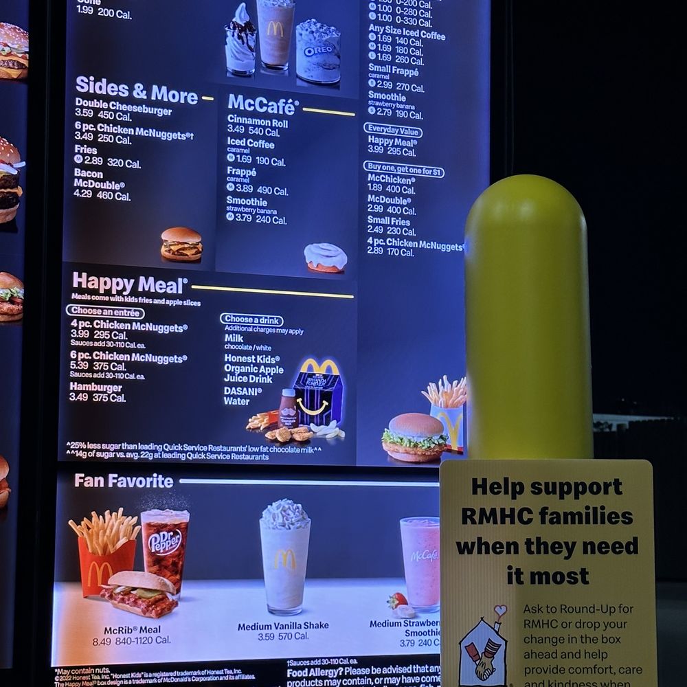 McDonald's - a menu and a drink in front of a large screen - Fast Food Near Me - Washington, North Carolina