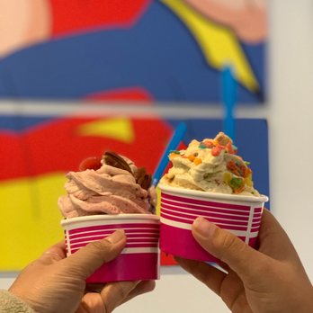 Trash Ice Cream - two hands holding two cups of ice cream - Ice Cream & Frozen Yogurt Near Me - Bentonville, Arkansas Trash Ice Cream - two hands holding two cups of ice cream - Ice Cream & Frozen Yogurt Near Me - Bentonville, Arkansas