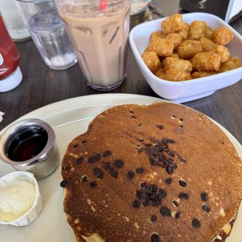 Millie's Cafe - GF chocolate chip pancakes with a side of tater tots - Breakfast & Brunch Near Me - Los Angeles, California Millie's Cafe - GF chocolate chip pancakes with a side of tater tots - Breakfast & Brunch Near Me - Los Angeles, California