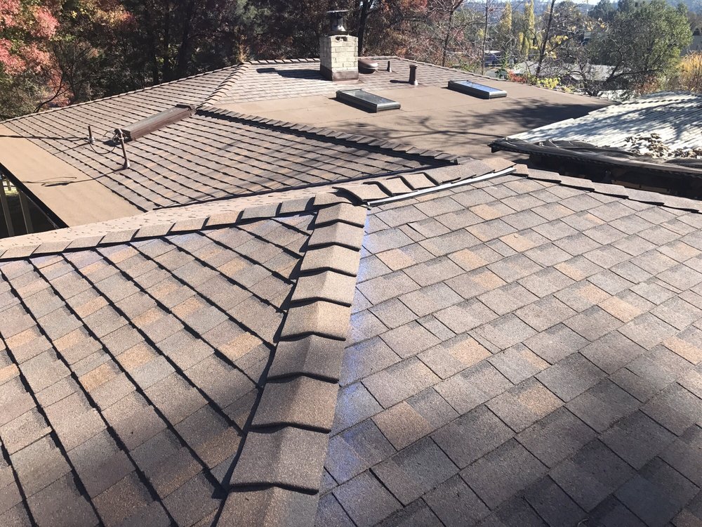 Slide of Kelly Roofing