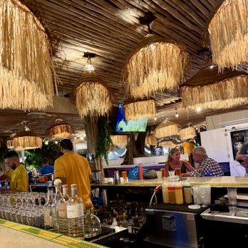 Lola’s On the Water - Lola's outside Tiki bar - American Near Me - Pompano Beach, Florida Lola’s On the Water - Lola's outside Tiki bar - American Near Me - Pompano Beach, Florida
