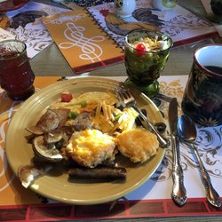 The Chicken Coop Bed & Breakfast - Cheese Biscuit,Chicken Sausage,Southwestern Eggs,Potato Skins,Yogurt Fruit parfait ,Cranberry Juice,Coffee