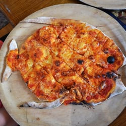 Caprice Restaurant - The fish-shaped pizza at Caprice Pizzarama. 2011 d. mancino