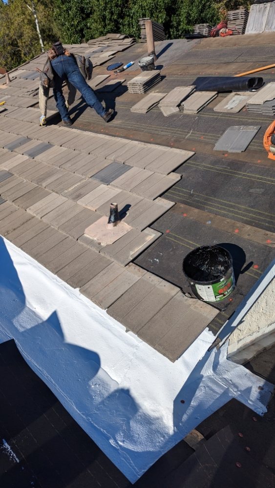 Slide of Nathan Roofing