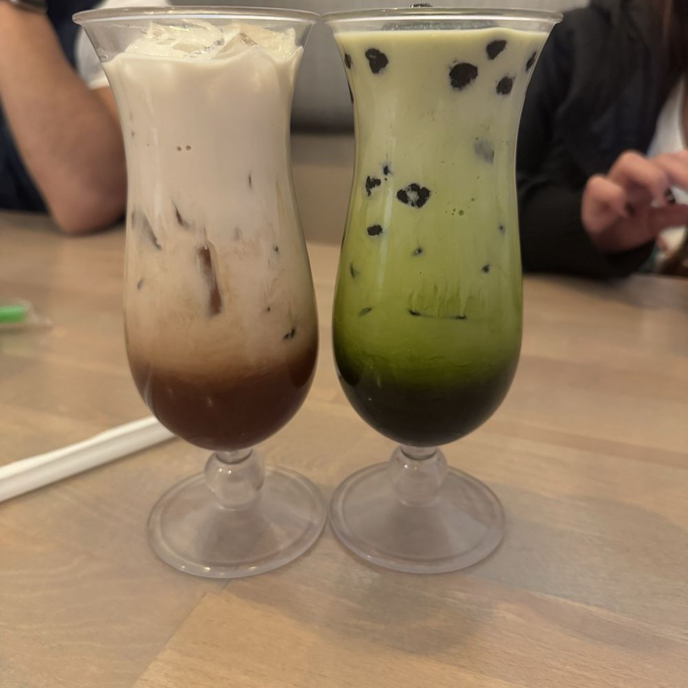 Milk tea with no boba & Matcha green tea with mochi and boba Milk tea with no boba & Matcha green tea with mochi and boba