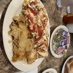 Build your own omelette with home fries and wheat toast