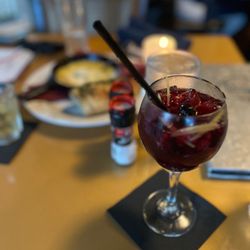 Rain - Pomegranate and Pear Sangria. Background: Fontina Cheese and bread Appetizer