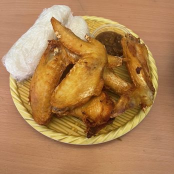 Banh Somtum - Chicken wings with sticky rice and tomato sauce dipping - Laotian Near Me - Houston, Texas