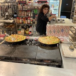 Sara watching over the Paella we prepared. Sara watching over the Paella we prepared.