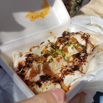 White Bear - Wonton in spicy sauce, standing outside hovering over the box and eating them on the street like a rat. - Chinese Near Me - Flushing, New York White Bear - Wonton in spicy sauce, standing outside hovering over the box and eating them on the street like a rat. - Chinese Near Me - Flushing, New York