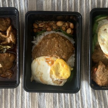 The Kedai Nasi - three trays of food - Food Delivery Services Near Me The Kedai Nasi - three trays of food - Food Delivery Services Near Me