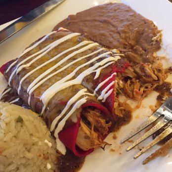 Cenas Kitchen - Chicken enchiladas with chili con carne sauce - Tex-Mex Near Me - Houston, Texas