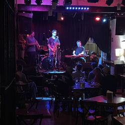 André Bretón - Band playing on stage