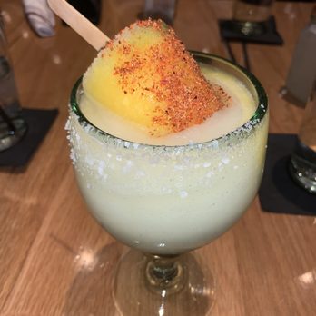 The Rustic - Mango margarita with a mango popsicle. Very tasty! - Venues & Event Spaces Near Me - Houston, Texas