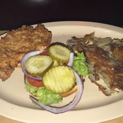 Sportsman's Grille & Billiards - Breaded pork tenderloin sandwich and German fries.