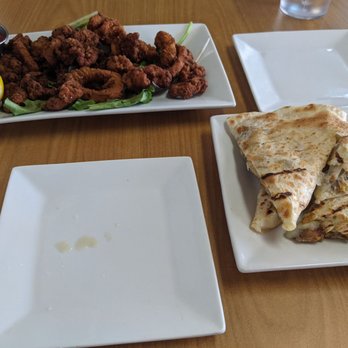 Takos and Beer - Calamari and chicken quesadilla (ignore the drops of green salsa on the side plate) - Tacos Near Me - Yuma, Arizona Takos and Beer - Calamari and chicken quesadilla (ignore the drops of green salsa on the side plate) - Tacos Near Me - Yuma, Arizona