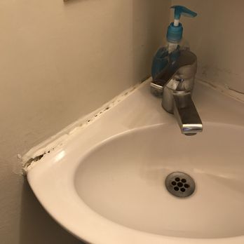 Capitola Beach Suites - Sink falling off wall and broken $1 soap dispenser. - Hotels Near Me - Capitola, California