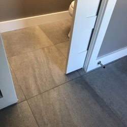 Distinctive Tile and Design - Continues into half bath